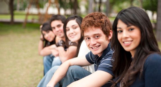 Image of a group of young people linking to the Youth Testimonials page